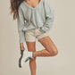 Light blue ribbed knit off-the-shoulder Casey Top sweater
