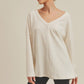 Casey Top: cream ribbed knit long-sleeve v-neck blouse