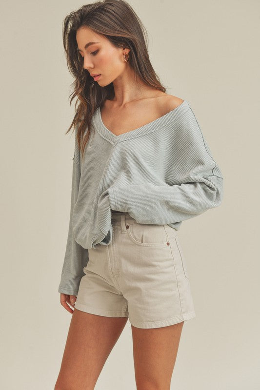 Light blue ribbed knit off-the-shoulder Casey Top sweater