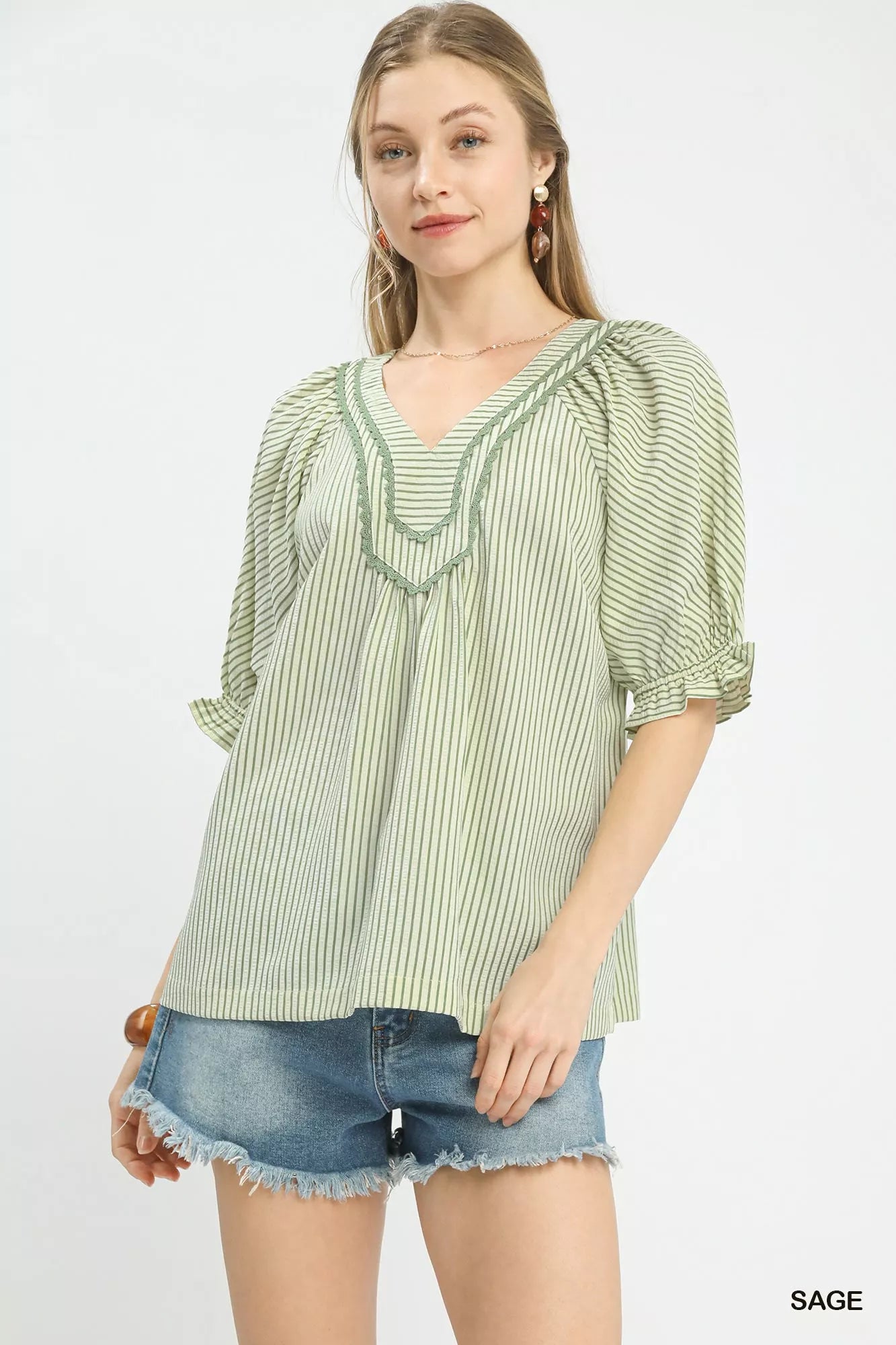 Sage green and white striped Umgee V-neck blouse with puff sleeves