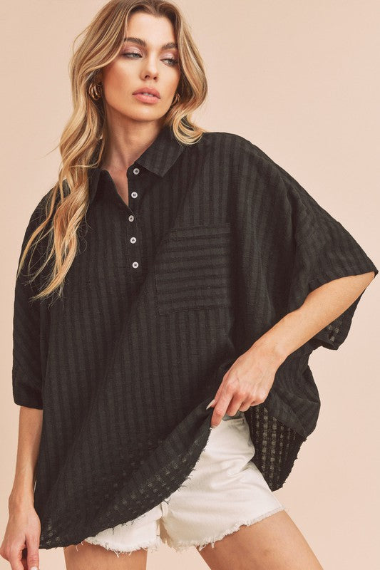 Black ribbed knit striped cotton blouse with sheer mesh hem