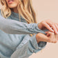 Aemi + Co light blue ribbed mock neck ruched sleeve sweater
