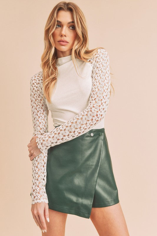 White ribbed turtleneck top with long sheer lace sleeves by Aemi + Co, small