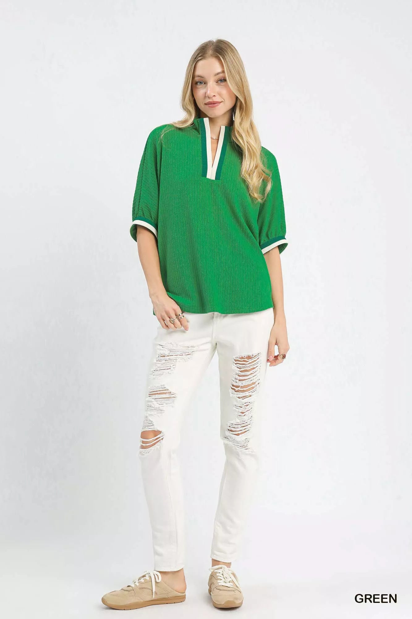 Umgee green white striped polo shirt with contrast trim, distressed jeans, beige sneakers