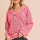 Pink textured Aemi + Co hooded pullover with buttons and pocket