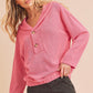 Pink textured knit Aemi + Co button front relaxed fit hoodie