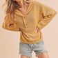 Cozy mustard-yellow Aemi + Co button-front relaxed-fit knit hoodie