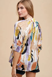 Annie Wear Multi Color Printed V-Neck Open Woven Blouse Top | Daverri Fashions