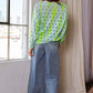 Davi & Dani two-tone ribbed hem openwork knit top in neon green and blue stripes with black dots