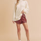 Cream-colored textured knit sweater with side slit hem, mock neck, Aemi + Co
