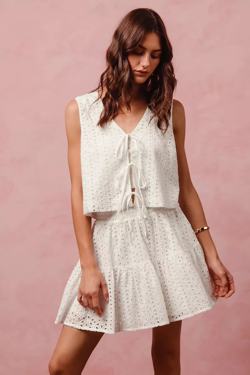 White eyelet lace sleeveless SO ME vest top with v-neck tie front