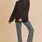 Black textured knit sweater with side slit hem in small
