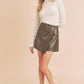 Olive green faux leather wrap skirt with Aemi + Co top