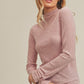Soft pink ribbed Aemi + Co mock neck ruched sleeve turtleneck top