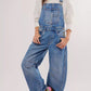 Wide strap wide leg denim overalls in blue with relaxed cut and pockets
