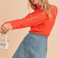 Aemi + Co mock neck knitted lace sleeve top in vibrant orange, size small