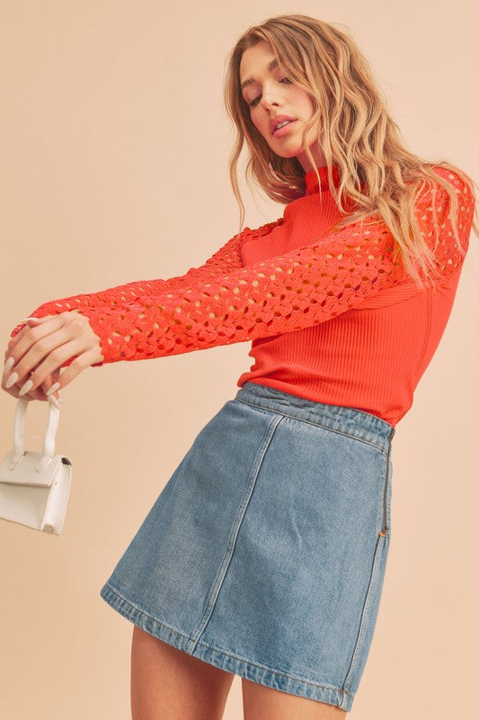 Aemi + Co mock neck knitted lace sleeve top in vibrant orange, size small