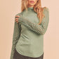 Moss green ribbed mock neck top with long open-knit sleeves by Aemi + Co, size small