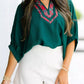 Daverri Fashions emerald green blouse with red black plaid V-neck trim