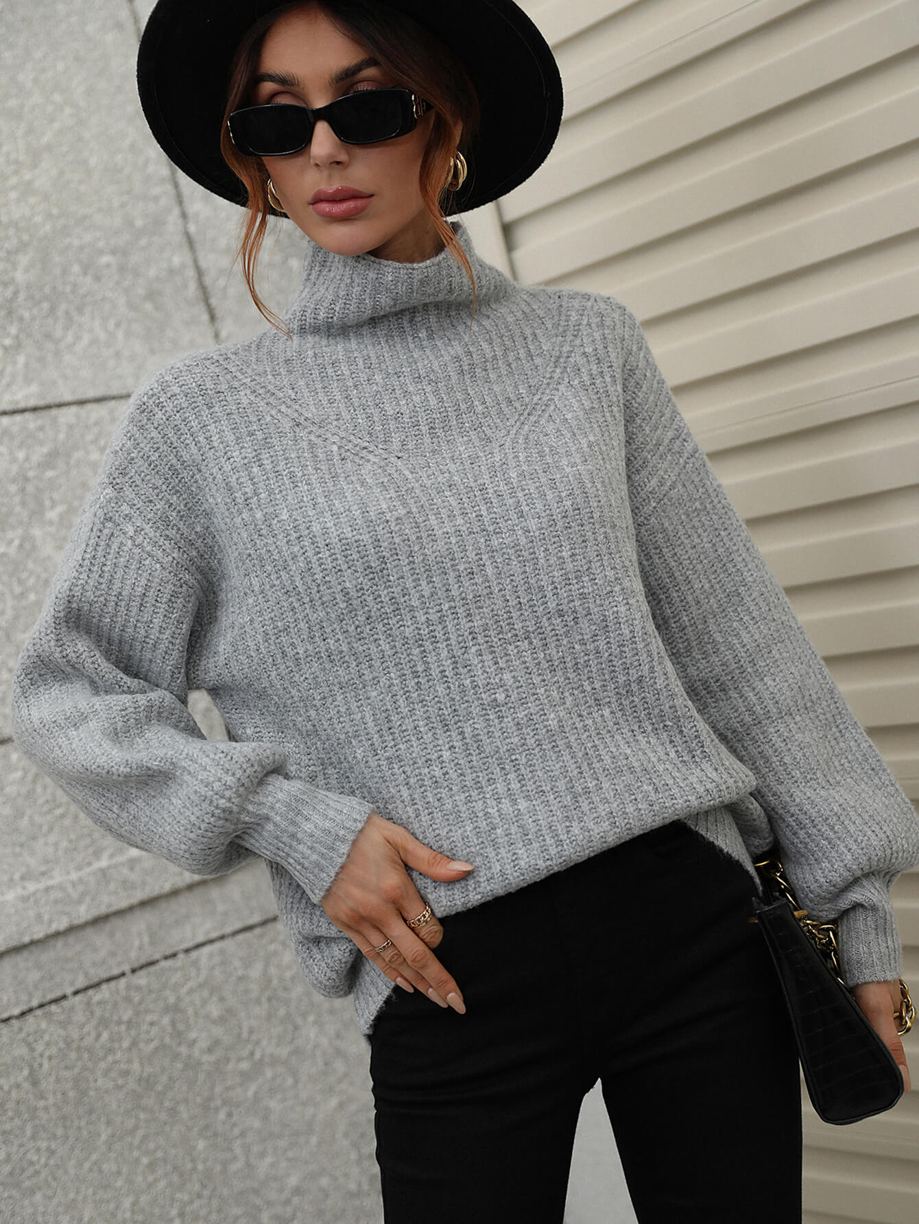 Cozy light gray ribbed knit turtleneck sweater with balloon sleeves