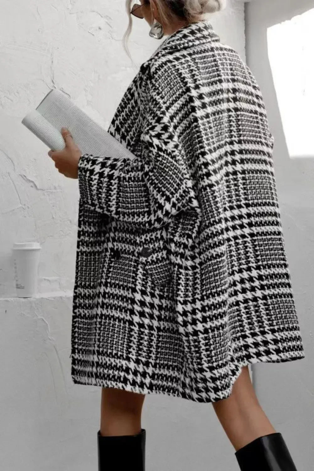 Black and white houndstooth collared long sleeve coat with oversized pockets
