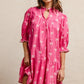 Vibrant pink BiBi ribbon pattern dress with puffed sleeves and tiered skirt