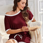 Maroon off-the-shoulder ribbed knit pajama set with white trim and drawstring shorts.
