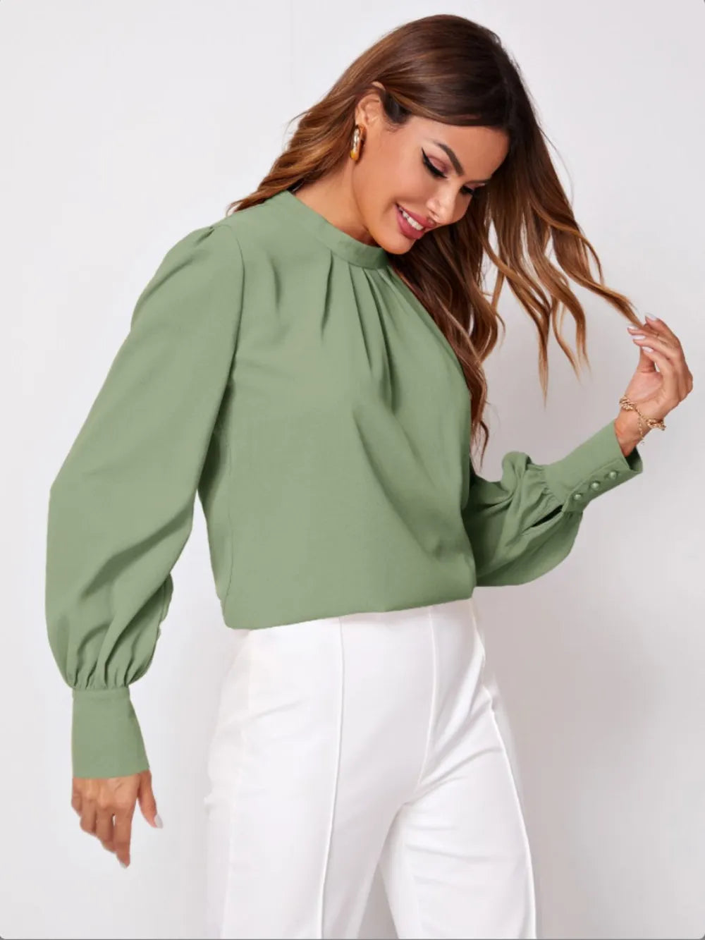 Stylish olive green ruched mock neck blouse with puffed sleeves