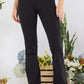 Black high-waisted butterysoft yoga flare pants in stretchy fabric