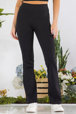 Black high-waisted butterysoft yoga flare pants in stretchy fabric