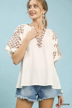 Umgee embroidered sleeve top with cream blouse and brown paisley neckline