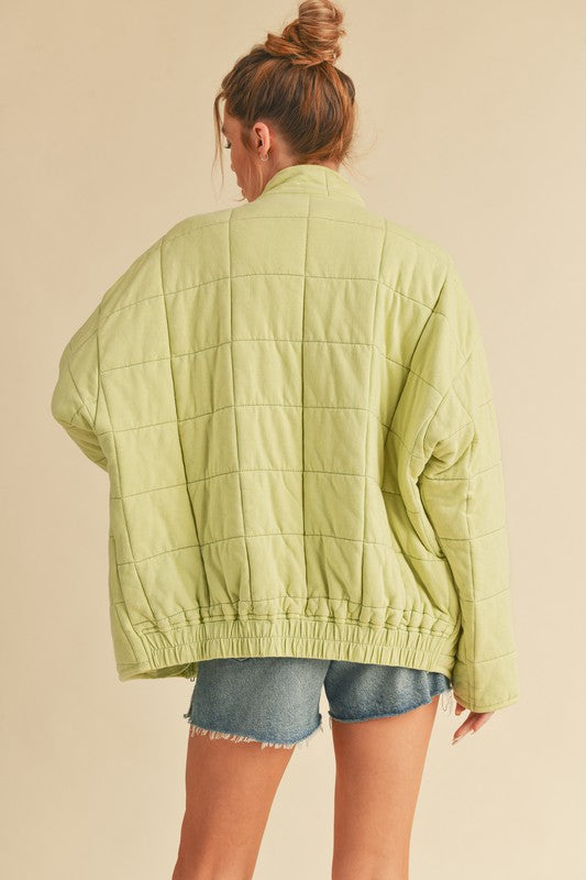 Light green quilted Dixie Jacket with relaxed fit and elastic waistband