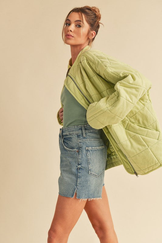 Light green quilted Dixie Jacket with soft padded texture and stitching