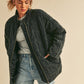 Black quilted denim Dixie Jacket with high collar and zipper