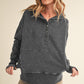 Dark gray distressed cotton Washed Vivi Pullover hoodie with buttoned placket and ribbed cuffs