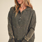 Dark gray distressed Washed Vivi Pullover hoodie with buttoned placket and ribbed cuffs