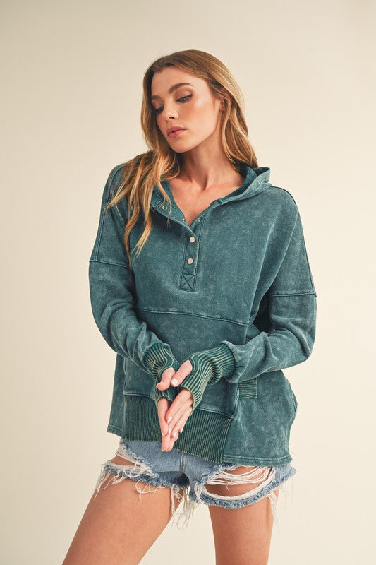 Teal distressed cotton Washed Vivi Pullover hoodie with buttoned placket and ribbed cuffs