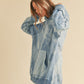 Kalia Tie Dye Hoodie: light blue oversized distressed look with pockets