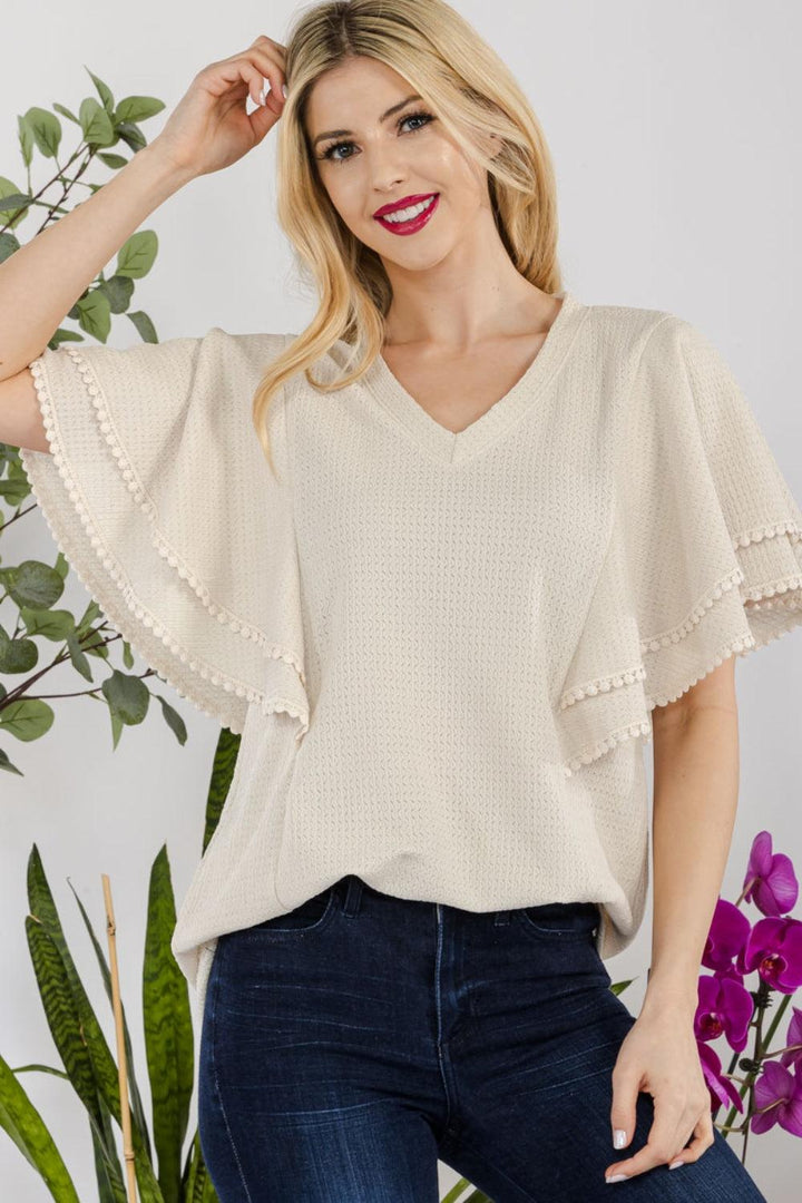 Celeste Full Size V-Neck Lace Trim Flutter Sleeve Top BEIGE Shirts & Tops