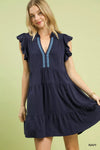 Navy blue Umgee Linen Tiered Baby Doll Dress with ruffled sleeves and light blue chain embroidery
