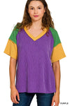 Purple ribbed v-neck top with green and yellow raglan sleeves