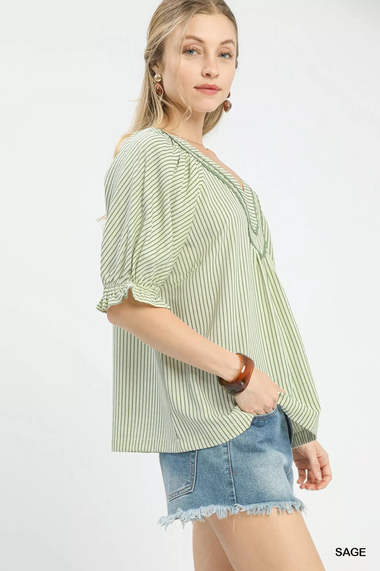 Light green and white Umgee Stripe V-Neck Blouse with ruffles
