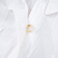 Translucent amber button on white womens lace sleeve cotton shirt