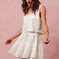 White eyelet lace SO ME floral vest top and tiered mini skirt set
