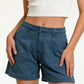 Daverri pocketed denim shorts in blue with rolled cuffs and front pockets