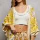 Yellow and cream crochet open cardigan with lace and scalloped edge