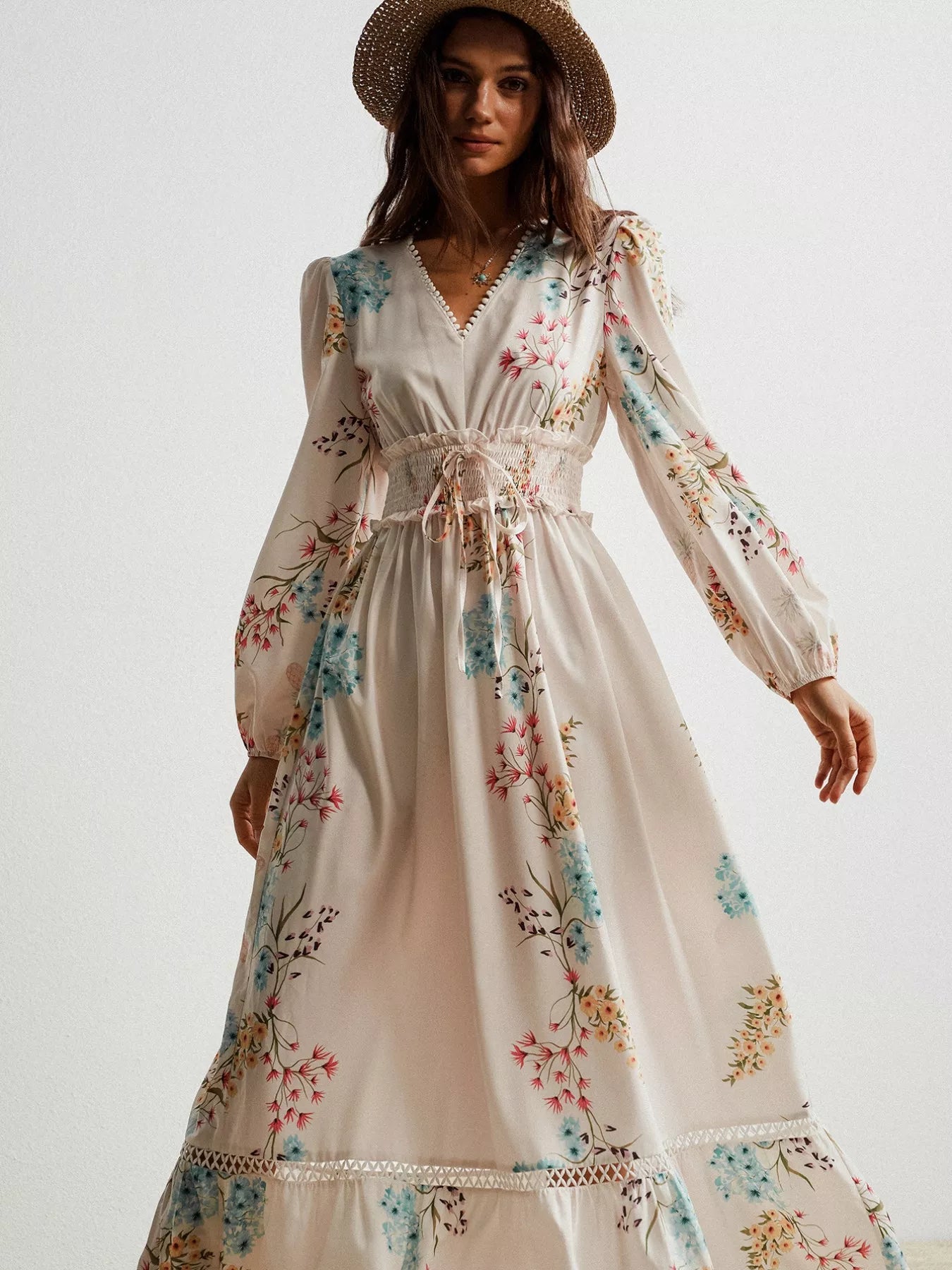 Floral print long sleeve maxi dress with smocked waist and v-neckline