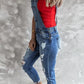 Daverri wide strap distressed denim overalls with blue patches and rolled cuffs