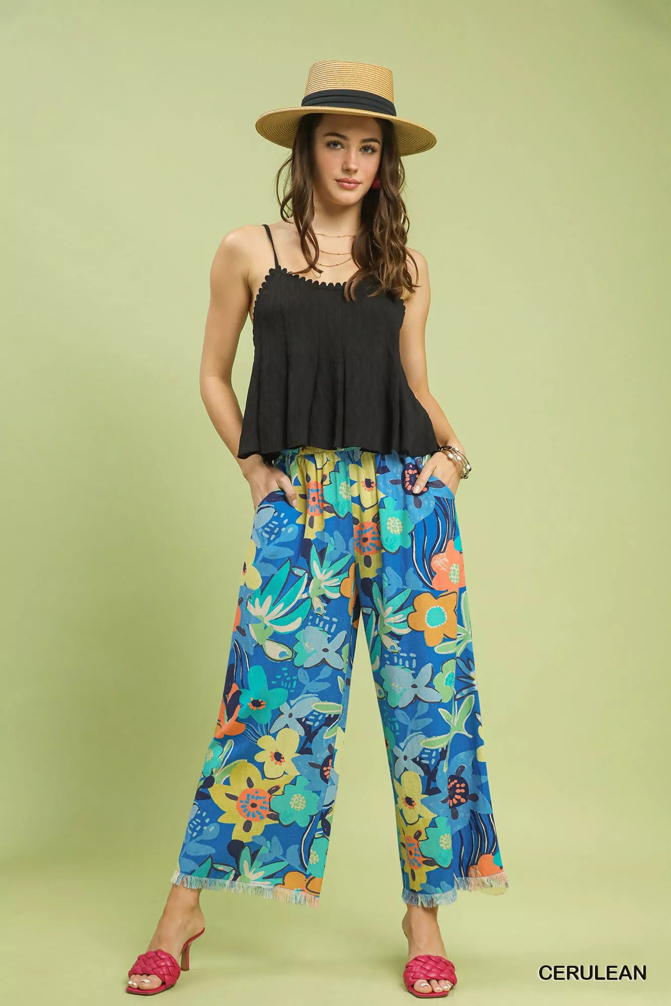 Umgee floral print wide-leg pants in vibrant blue, yellow, orange with frayed hem
