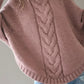 Cozy dusty rose cable-knit poncho sweater with ribbed cuffs